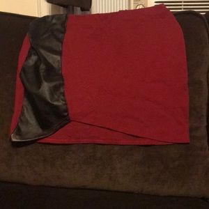 Small/med short red and black faux leather skirt